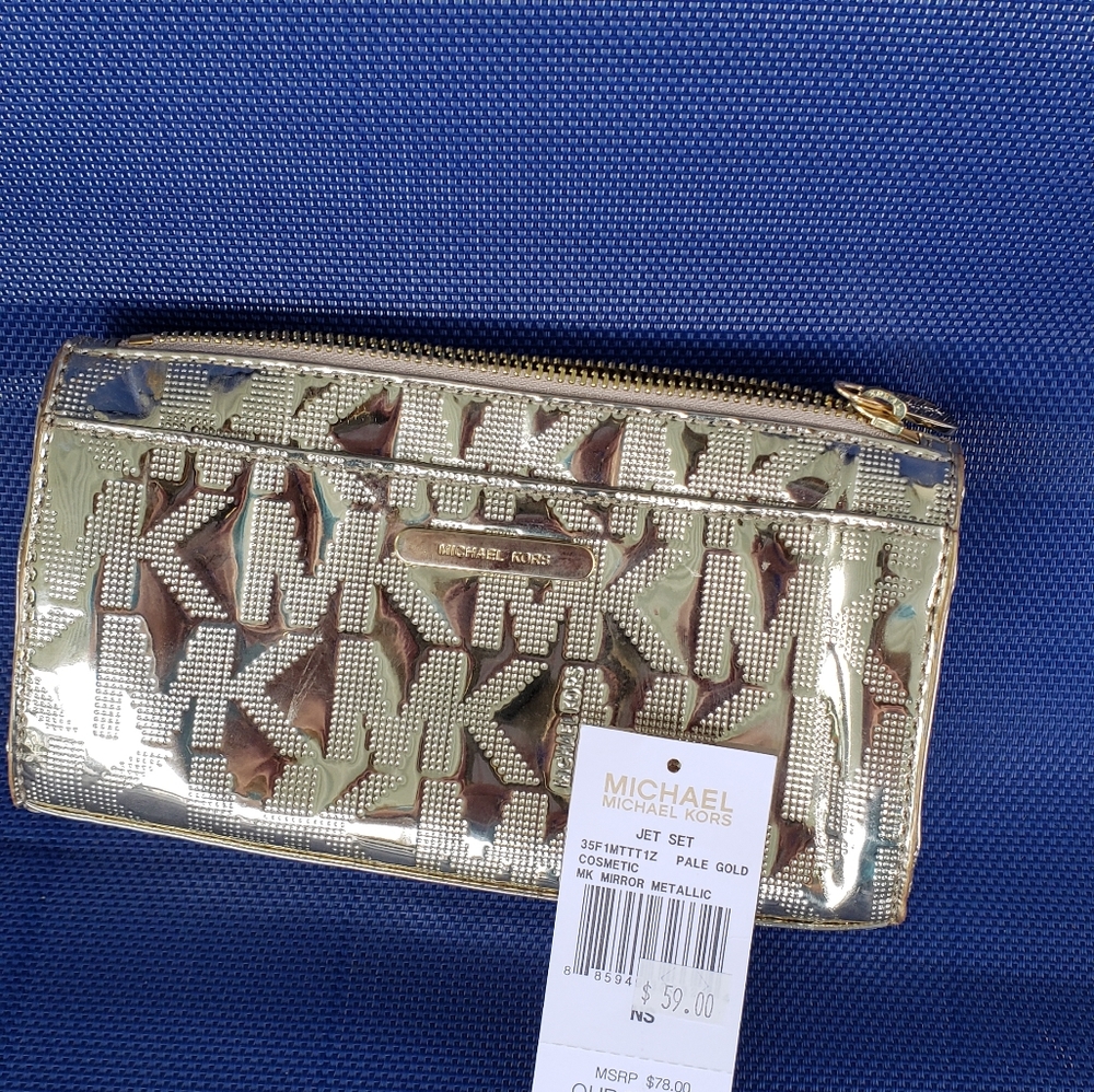 Michael Kors NWT. Gold make up pouch